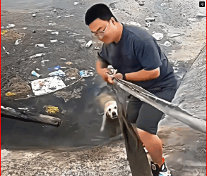 M0112005_poor dog couldn climb up got stuck, but good man came an…_part2